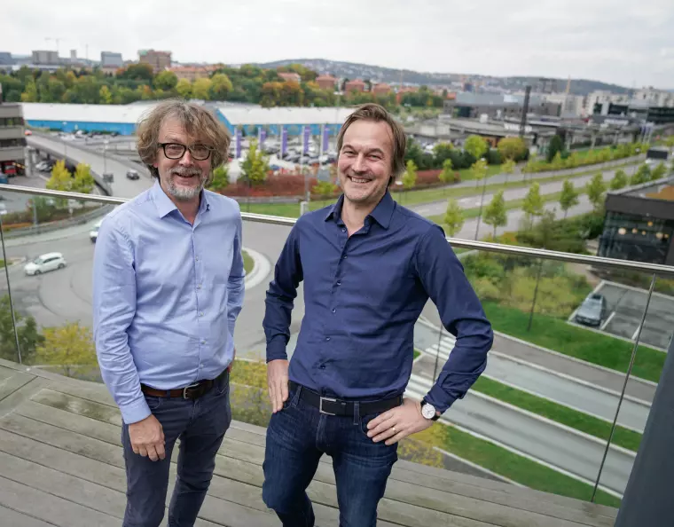 HAPPY AND FUNDED: CEO of Labrador CMS Jon Reidar Hammerfjeld, left, and Chair of the Board Jan Thoresen celebrating closing of the latest funding round to expant international sales and onboarding.